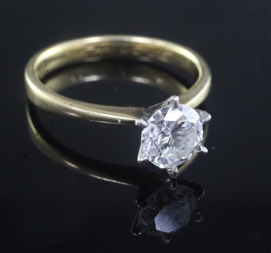 A gold and solitaire diamond ring, size M.